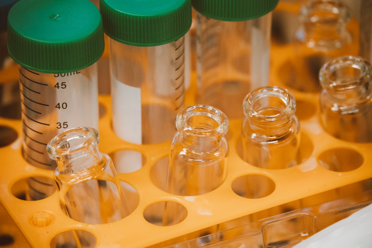 A close-up view of laboratory test tubes in an orange rack, highlighting sterile conditions.